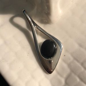 Black and silver pendant